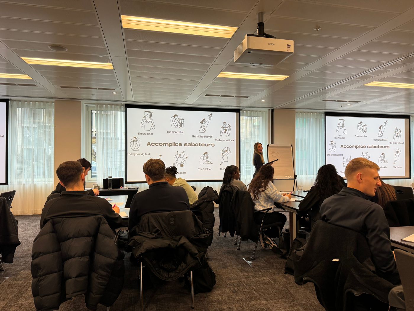 Lucy running a workshop for a group at Mace
